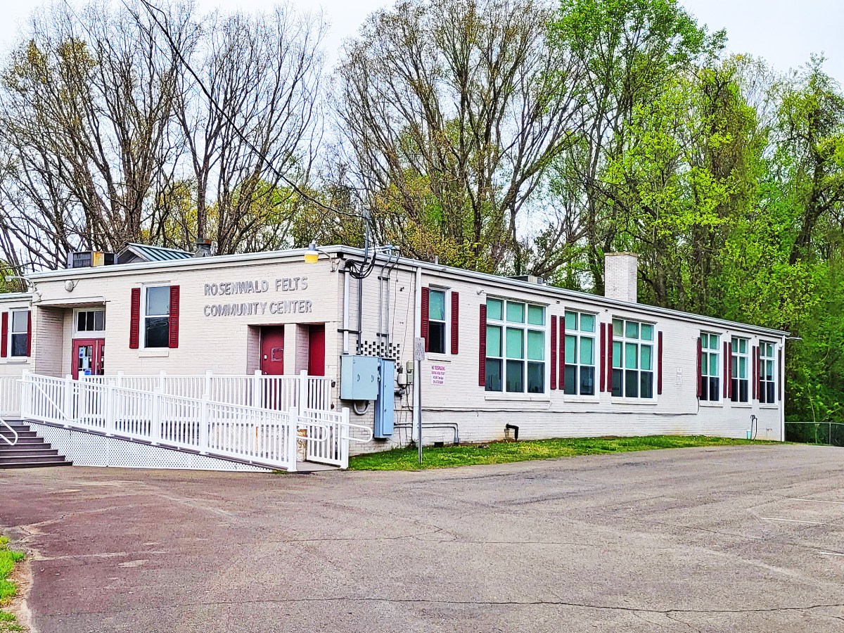The exterior of a white single-story building that once housed the Rosenwald Felts School in Galax.
