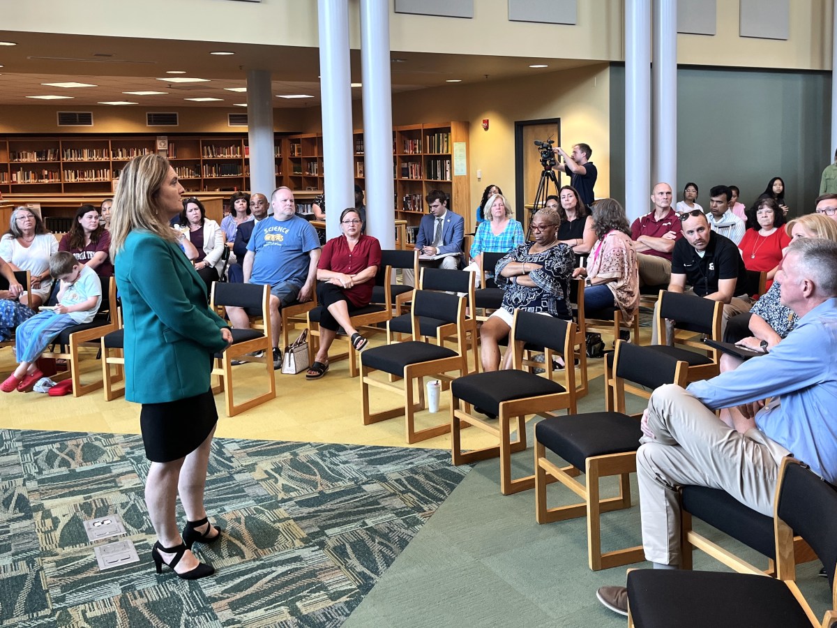 Lisa Coons, Virginia’s superintendent of public instruction, listens to attendees of a “cellphone-free education” feedback session at Northside High School in Roanoke on July 31.